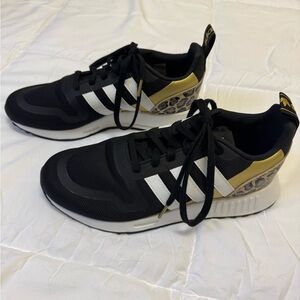 Adidas Black and Gold Athletic Shoes with Sock-Like Collar